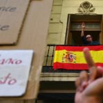 Why do many people see Spain’s flag as a fascist symbol?