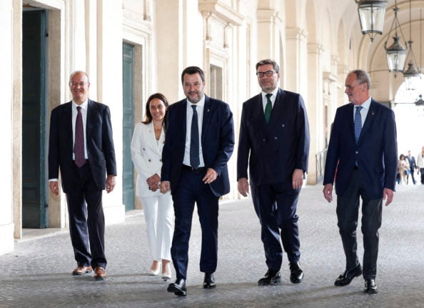 Italy's newly-named Minister of Education and Merit Giuseppe Valditara (L) with other members of the newly-formed cabinet on October 22, 2022 in Rome. 