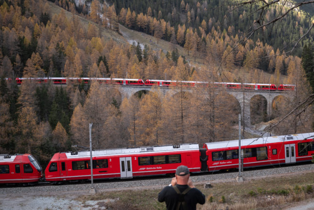 IN PICTURES: World’s longest passenger train winds through Swiss Alps