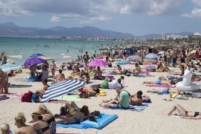 Spain’s sharp rise in tourists still below pre-pandemic levels