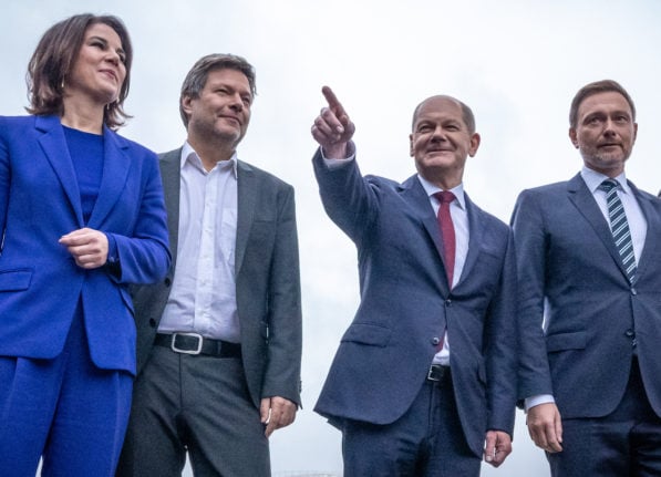 Annalena Baerbock and Robert Habeck of the Greens with the SPD's Olaf Scholz and the FDP's Christian Lindner in November 2021 during coalition agreement negotiations.
