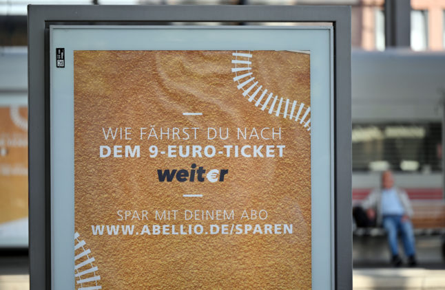 A sign advertises rail ticket subscriptions in Erfurt Central Station.