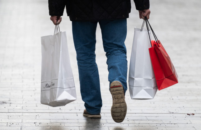 Man with shopping bags in germany