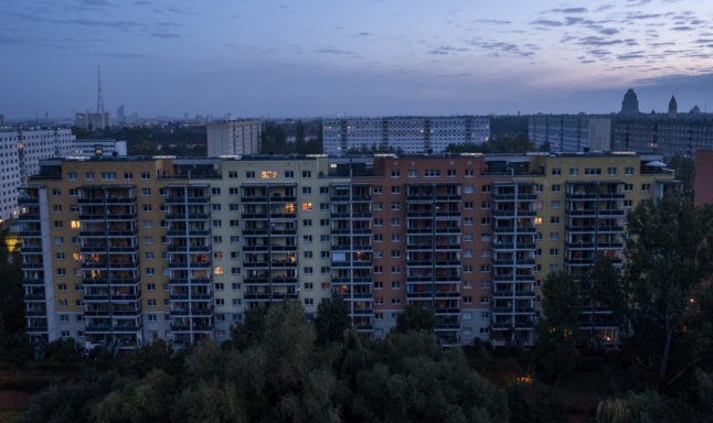 A few lights on in a Leipzig housing block. Electricity prices have been rising in Germany.