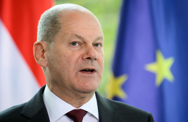 German Chancellor Olaf Scholz speaks at a press conference in Berlin with the Prime Minister of the Netherlands.