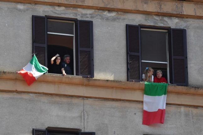 Italian residents singing 'Bella Ciao' in Rome.