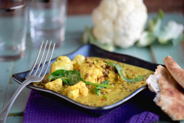 Where can you get authentic Indian food in Sweden's big cities?