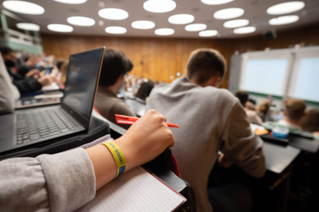 Students sit in a lecture at Hanover University.