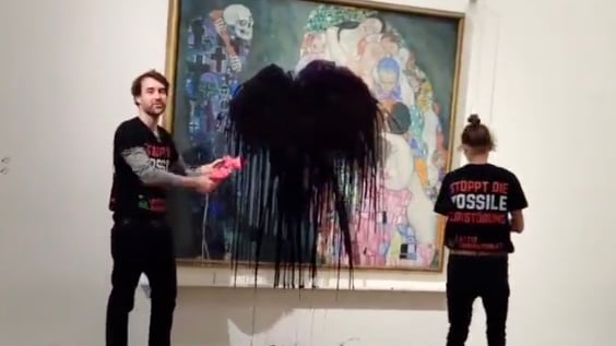 Eco-protesters pour black liquid on Klimt painting in Vienna museum