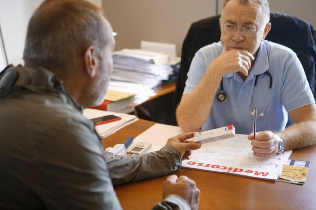 GP speaking with patient