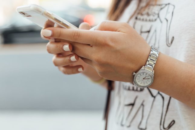 A woman with a phone