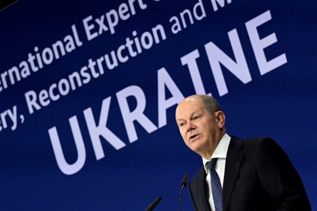In this file photo taken on October 25, 2022 German Chancellor Olaf Scholz addresses guests during the International Expert Conference on the Recovery, Reconstruction and Modernisation of Ukraine in Berlin.