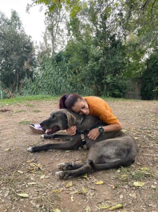 Chiara with one of the dogs at Ponte Marconi. 