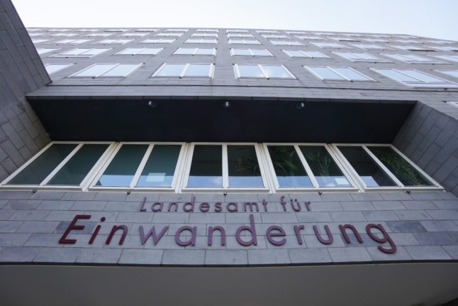 A sign on the State Office for Immigration (LEA) on Friedrich-Krause-Ufer in Berlin. 