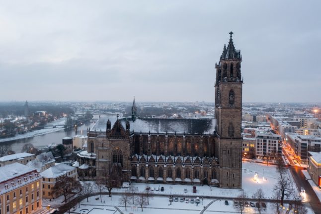 Light snowfall has transformed the city of Magdeburg into a wintry landscape.