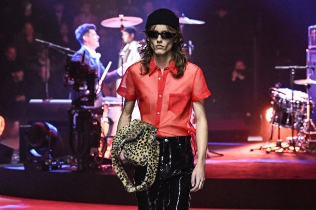 A model presents a creation for Gucci's men's fall/winter 2023/24 fashion collection in Milan