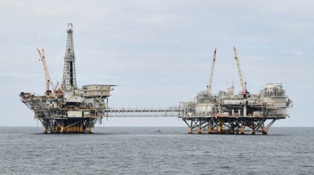 Pictured are two offshore oil platforms.