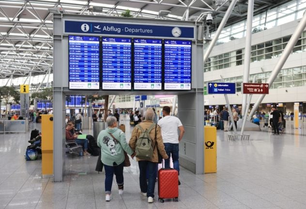 Passengers at Düsseldorf airport. 