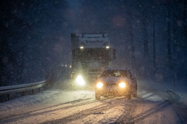 Car and lorry in snow