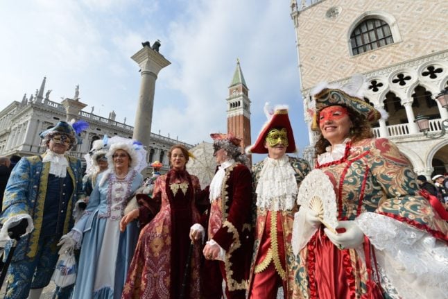 Masked revellers during Carnival celebrations in Venice