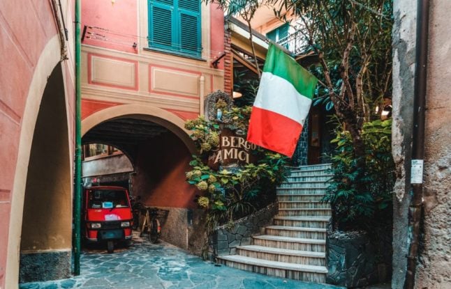 Alley in Italy and Italian flag