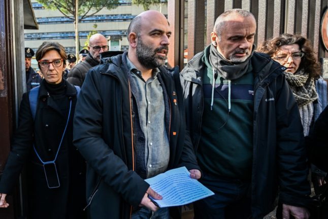 Italian writer Roberto Saviano leaves court on February 1, 2023, following a hearing in a defamation lawsuit from Italy's current Deputy Prime Minister.