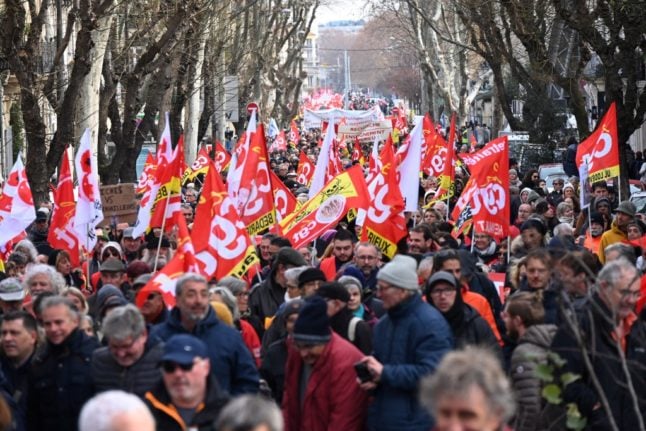French protest pension reform again as unions threaten to step up action