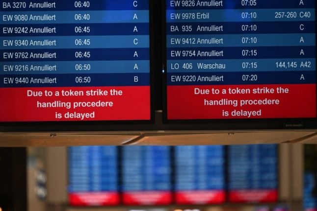Numerous flights are shown as cancelled on a screen at Düsseldorf Airport. The Verdi trade union has called on its members to stage warning strikes at airports in North Rhine-Westphalia and in the public sector.