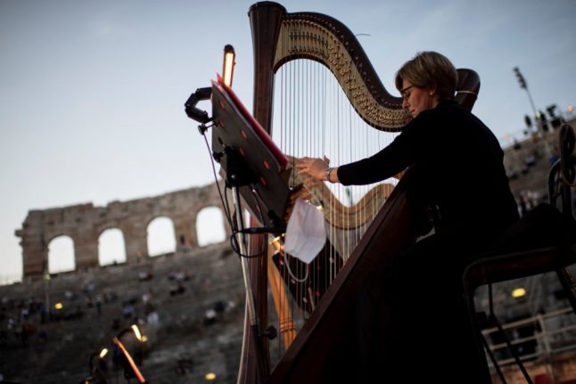 A harpist rehearses at the Verona Arena in 2020.