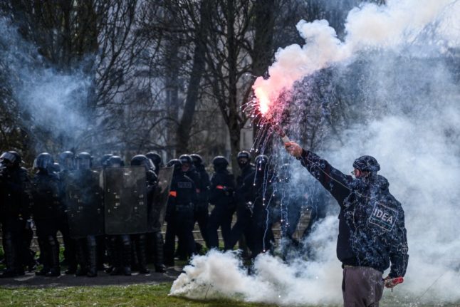 French protest over Macron forcing through pension reform
