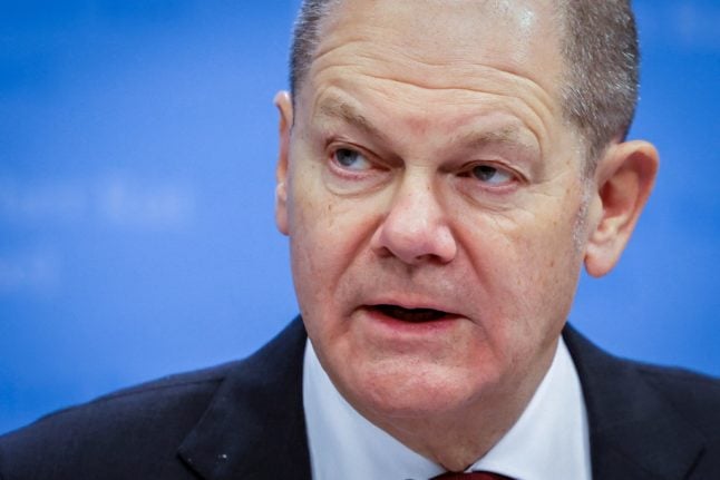 Germany's Chancellor Olaf Scholz speaks during a press conference after an EU Summit in Brussels