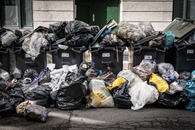Copenhagen bin collectors restart work after week-long strike 