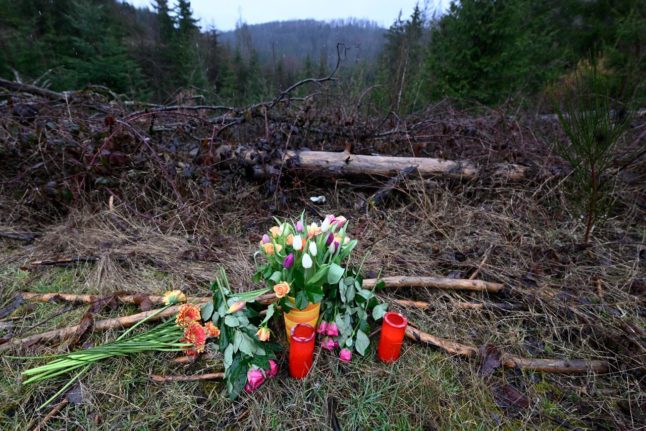 Flowers and tributes placed where a 12-year-old girl was stabbed to death in Freudenberg, western Germany.