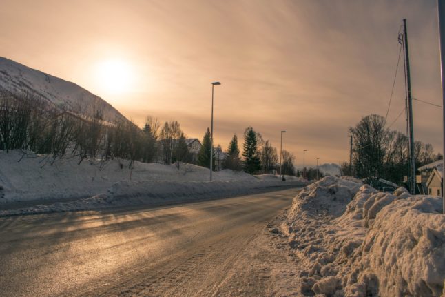 Pictured is a snowy road in Tromsø.