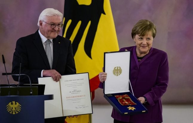 Merkel given Germany’s top honour despite criticism