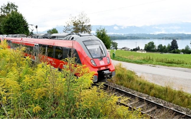 A regional train passes Staffelsee in Upper Bavaria
