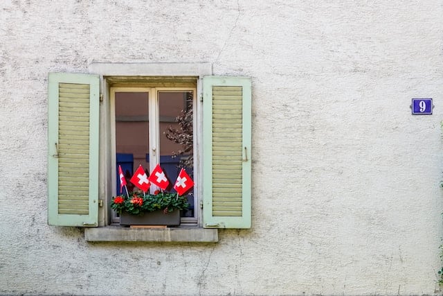 Swiss flags in a window in Zurich