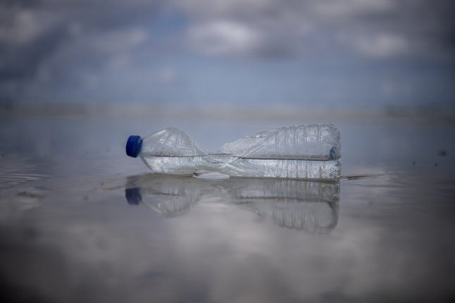A plastic bottle on the beach in Plomeur, western France.
