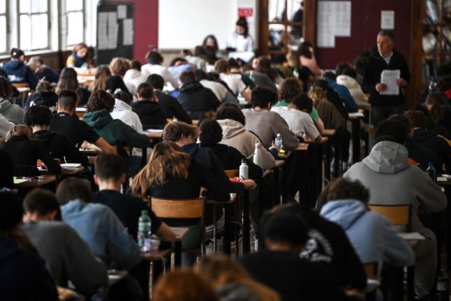 French high school teacher faces trial for burning exam papers