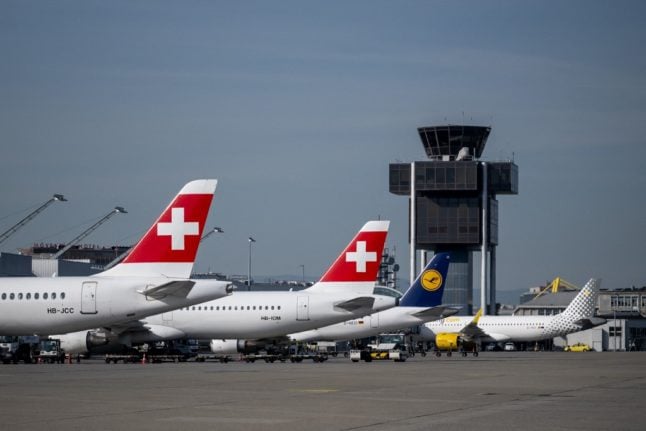Commercial planes of Swiss air lines, Lufthansa and Spanish low-cost airline Vueling parked on the tarmac of Geneva Airport on May 4th, 2023. (