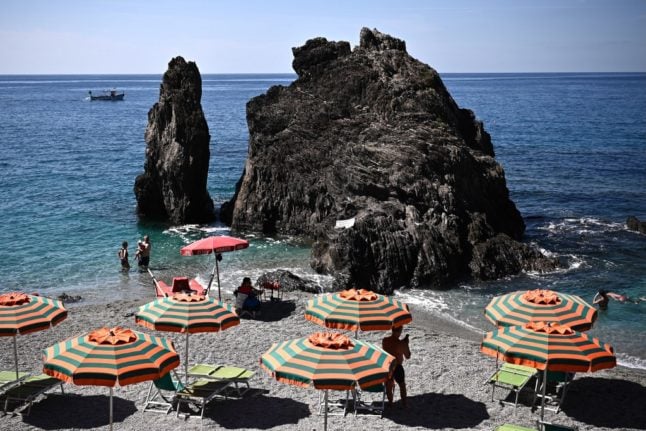 When do Italy's private beach clubs open for business?