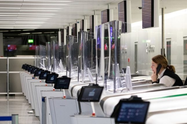 Empty check-in desks at an airport