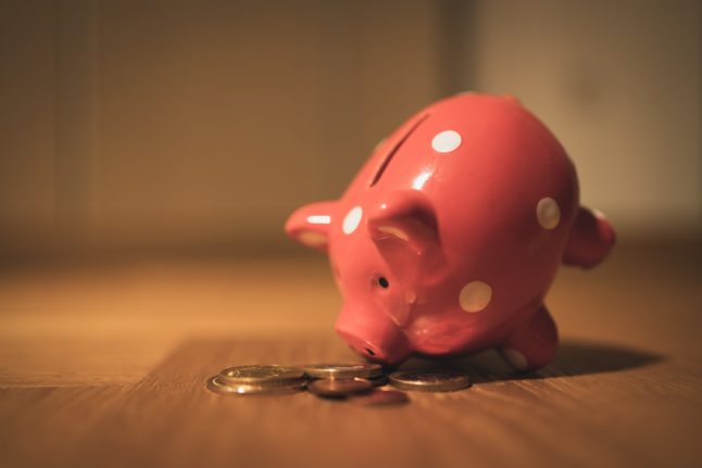 Pictured is a piggybank to represent savings.