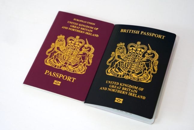 Pictured is a new design and old design (right) passport side by side,