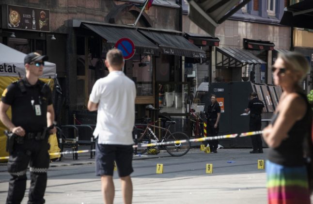 Pictured are police marks on the crime scene of the June 25th shooting in Oslo.