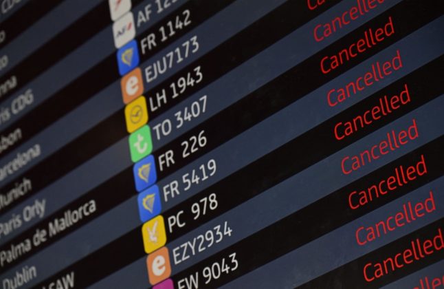 Flights cancelled as shown by departure board