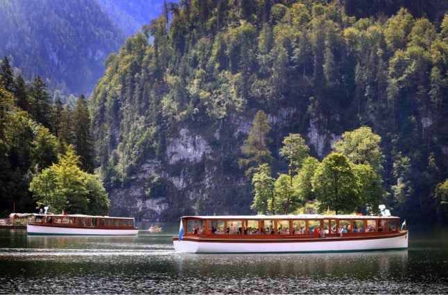 A boat glides across the Königsee in Bavaria 