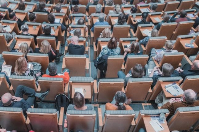 Pictured is a birds eye view of a university lecture hall.
