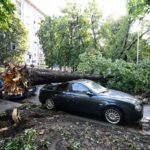 Seven killed in storms and wildfires as Italy divided by extreme weather