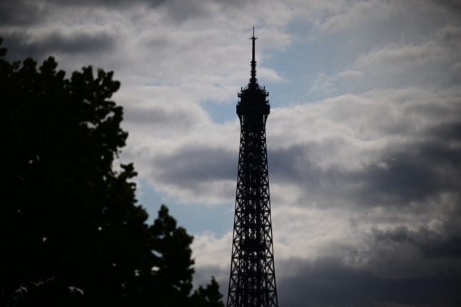 Base jumper leaps off top of Eiffel Tower before being arrested
